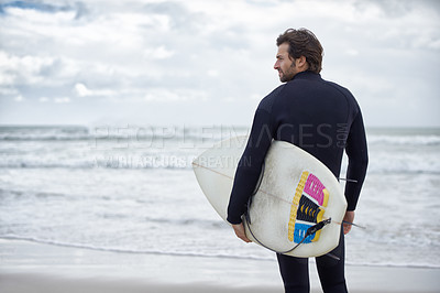Buy stock photo Man, surfer and beach for exercise, sport or waves on sandy shore in outdoor fitness. Rear view of male person or athlete with surfboard for surfing or hobby on ocean coast, sea or water in nature