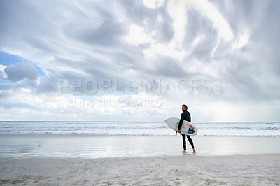 Buy stock photo Surfboard, ocean and man on beach for surfing on vacation, holiday and weekend for wellness. Travel mockup, fitness and person for water sports, hobby and exercise for adventure and training in sea