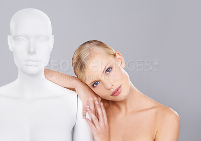 Buy stock photo Woman, face and beauty, relax on mannequin and unique for skincare, wellness and glow on white background. Portrait, natural cosmetics and dermatology with individuality, robot or dummy in studio