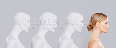 Buy stock photo Mannequins, posture and woman with skincare, cosmetics and beauty on a white studio background. Person, development and row with model and beauty with profile and robotic with creativity or glow