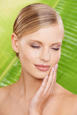 Buy stock photo Palm tree, skincare and woman with cosmetics, dermatology and grooming with luxury and glow. Person, natural treatment and girl with shine or leaf with wellness and soft with healthy skin or clean