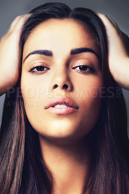 Buy stock photo Face, natural beauty and woman with hair, cosmetics treatment or keratin with clear skin on grey background. Portrait, skincare and dermatology, Brazilian model for haircare and wellness in studio