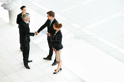 Buy stock photo Business people, shaking hands and thank you for welcome in introduction, hello and opportunity. Partnership, onboarding and coworkers in agreement, top view and promotion in office or collaboration