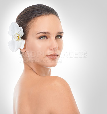 Buy stock photo Thinking, flower and woman with beauty, dermatology and skincare on white studio background. Person, model and girl with natural cosmetics or organic with smooth or wellness with shine or aesthetic