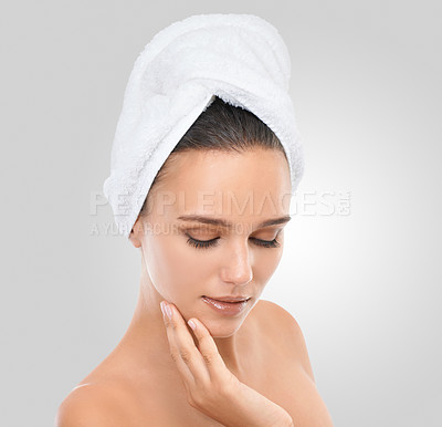 Buy stock photo Woman, skincare and beauty in studio, confidence and proud of healthy skin on white background. Female person, towel and satisfaction for facial treatment, cosmetics and dermatology for grooming