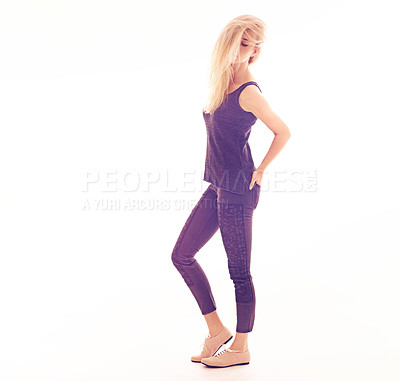 Buy stock photo Beauty, fashion and sexy with a woman model posing in studio isolated on a white background. Blonde female feeling confident, elegant and beautiful with bright, colorful and creative lighting