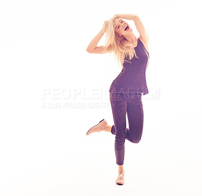 Buy stock photo Full length studio shot of a lively fashionable young woman