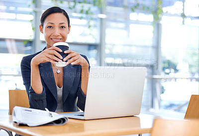 Buy stock photo An ethnic businesswoman working on her computer in an office