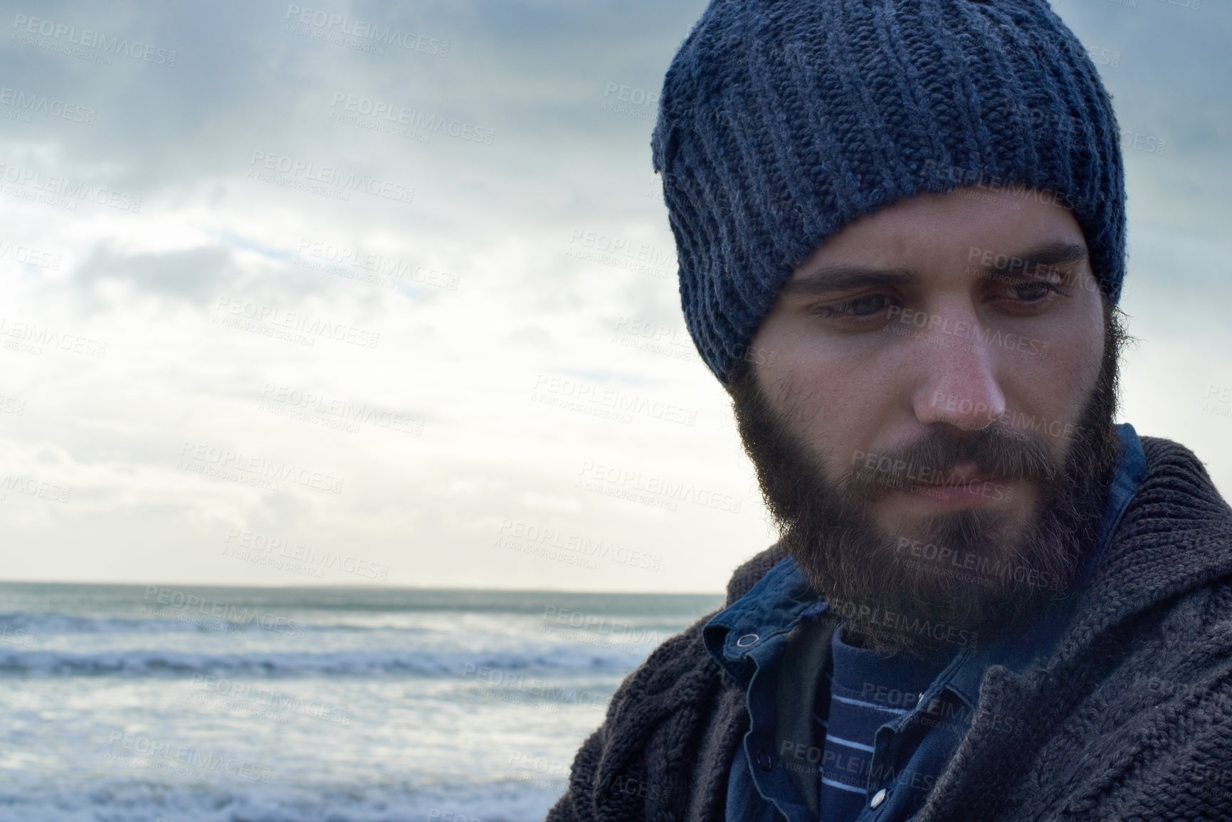 Buy stock photo Thinking, face and man at beach with memory, nostalgia or reflection with ocean view in nature. Remember, travel and male person at sea for fresh air, journey or peaceful Florida vacation in winter