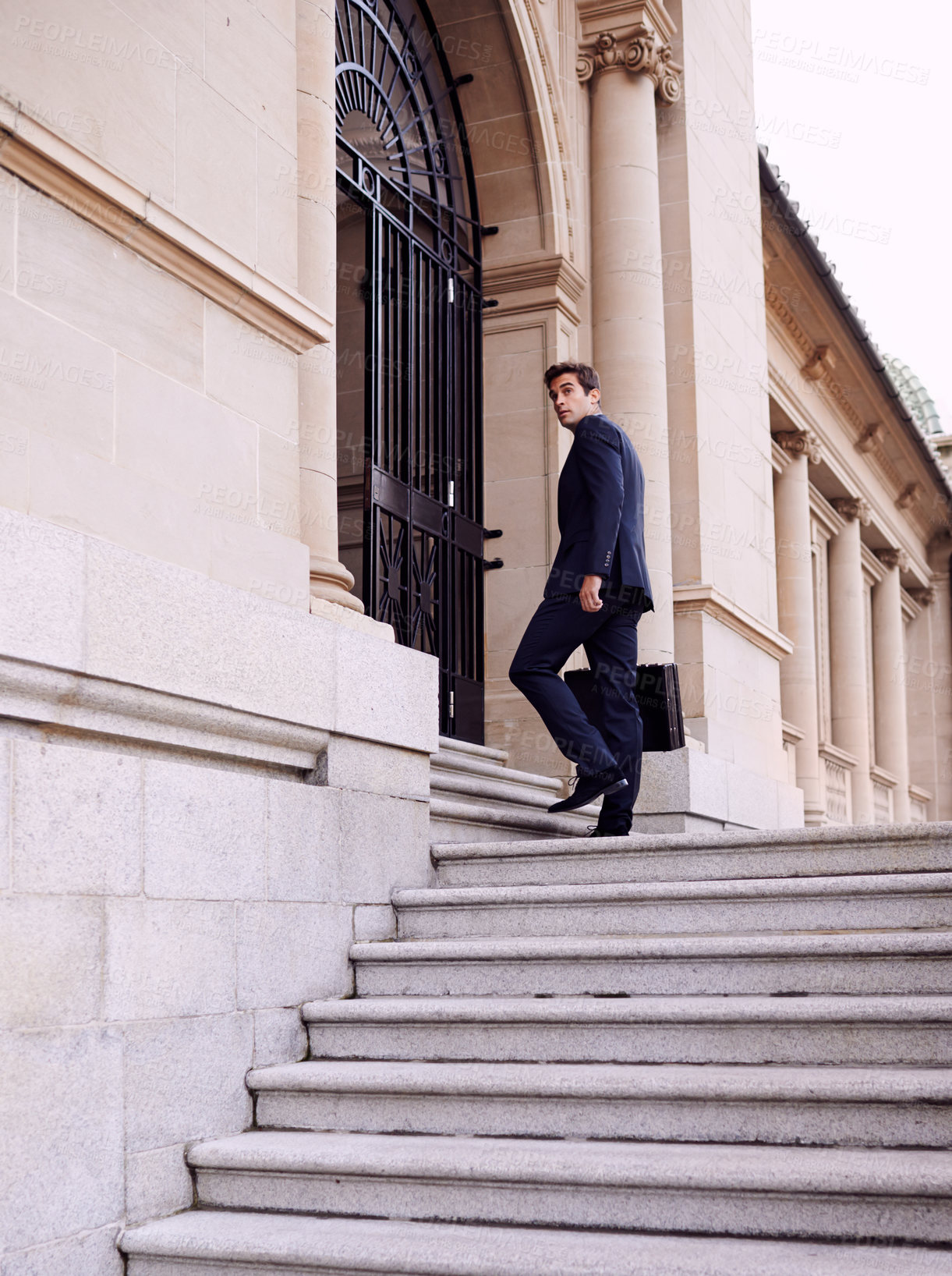 Buy stock photo Business, briefcase and man walking into law firm in city with evening commute, stairs and court building. Businessman, lawyer or attorney on outdoor steps with formal bag for urban travel from work