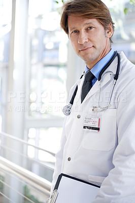 Buy stock photo Doctor, smile and clipboard in hospital for checklist, report or patient records in portrait. Medical professional, face and paper for information, schedule or treatment plans for cardiology