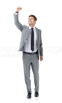 Buy stock photo Full-length shot of a young businessman with his arm raised in celebration