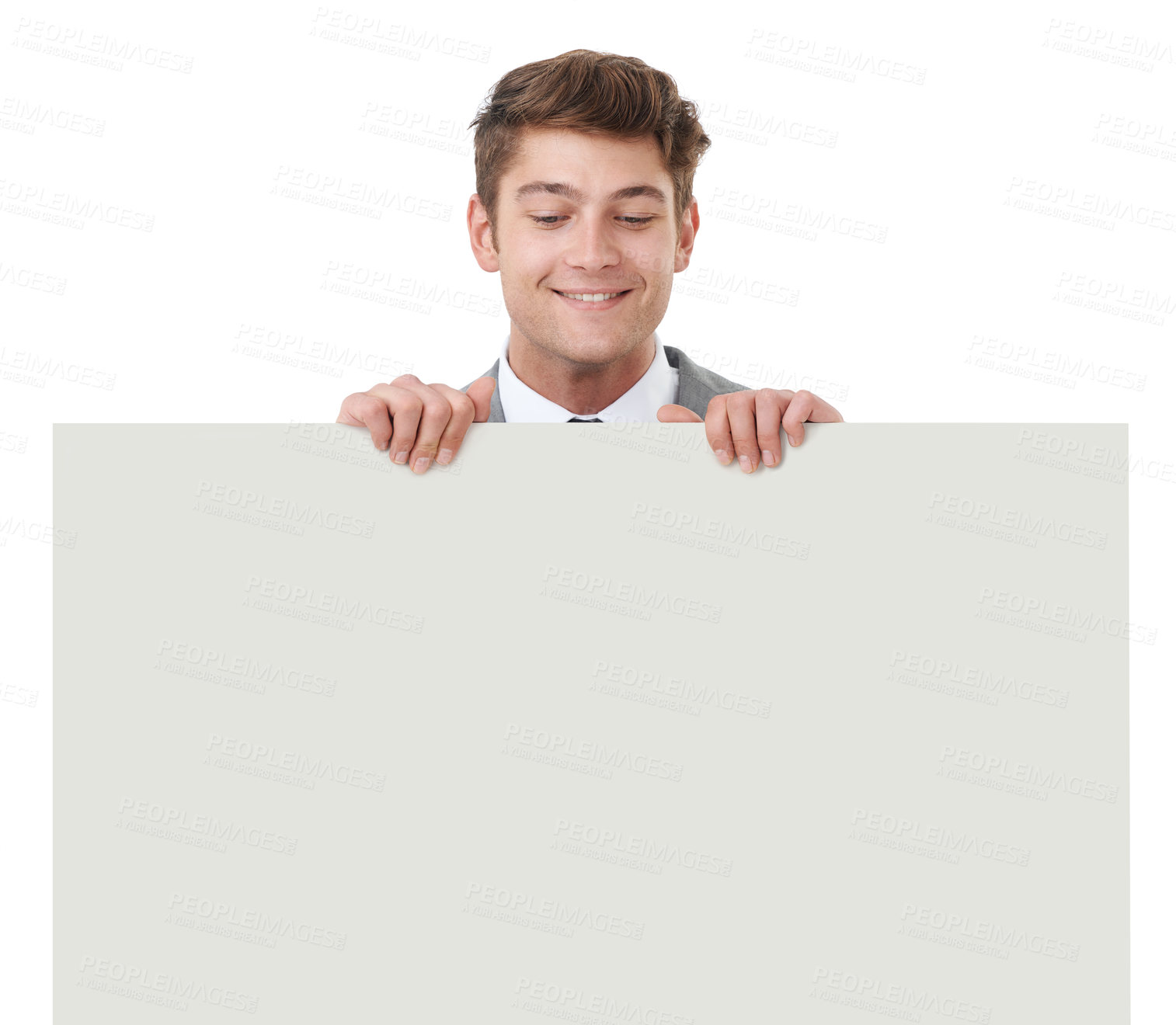 Buy stock photo Smile, poster and space with business man in studio isolated on white background for advertising or marketing, Billboard, mockup and promotion with happy young person holding banner for information