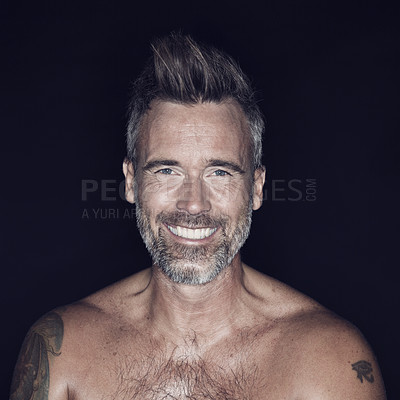 Buy stock photo Portrait, mature man and fitness with tattoo in smile on studio, black background and shirtless  with confidence. Body ink, muscular and positivity, exercise and fit with health, flexible and workout