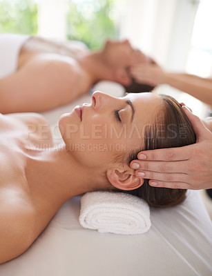 Buy stock photo Couple, massage and hands on head in spa for luxury treatment for wellness on calm holiday or vacation. Beauty, care and people relax together in hotel, salon or resort for healthy facial or skincare