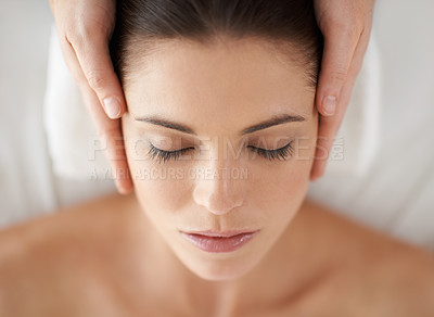 Buy stock photo Hands, above and facial massage of woman at spa to relax, peace and calm at luxury resort with masseuse. Top view, therapy and person at salon for face treatment, skincare and beauty for wellness