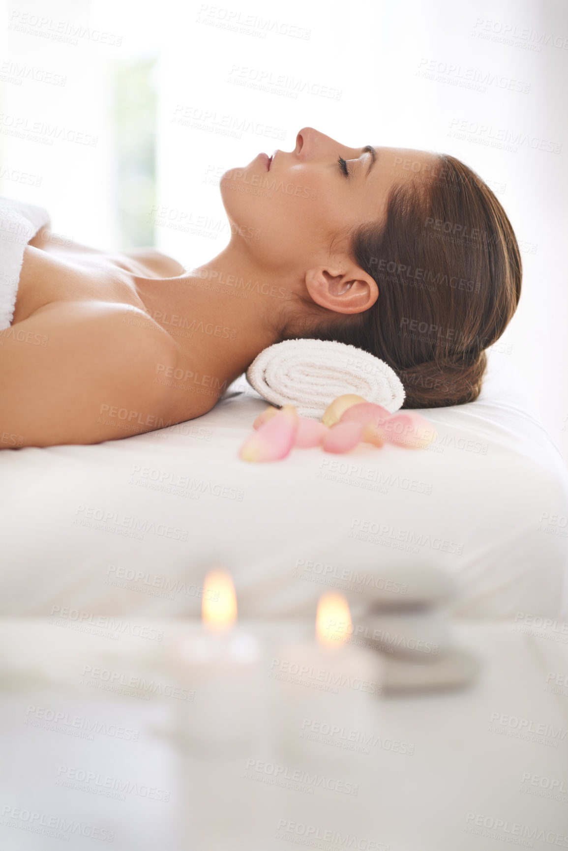 Buy stock photo A beautiful young woman relaxing at a spa