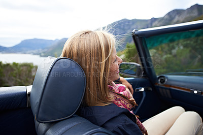 Buy stock photo Woman, relax and convertible or road trip outdoor on vacation or travel destination, adventure or holiday. Female person, face and transportation in London countryside or journey, drive or tourist