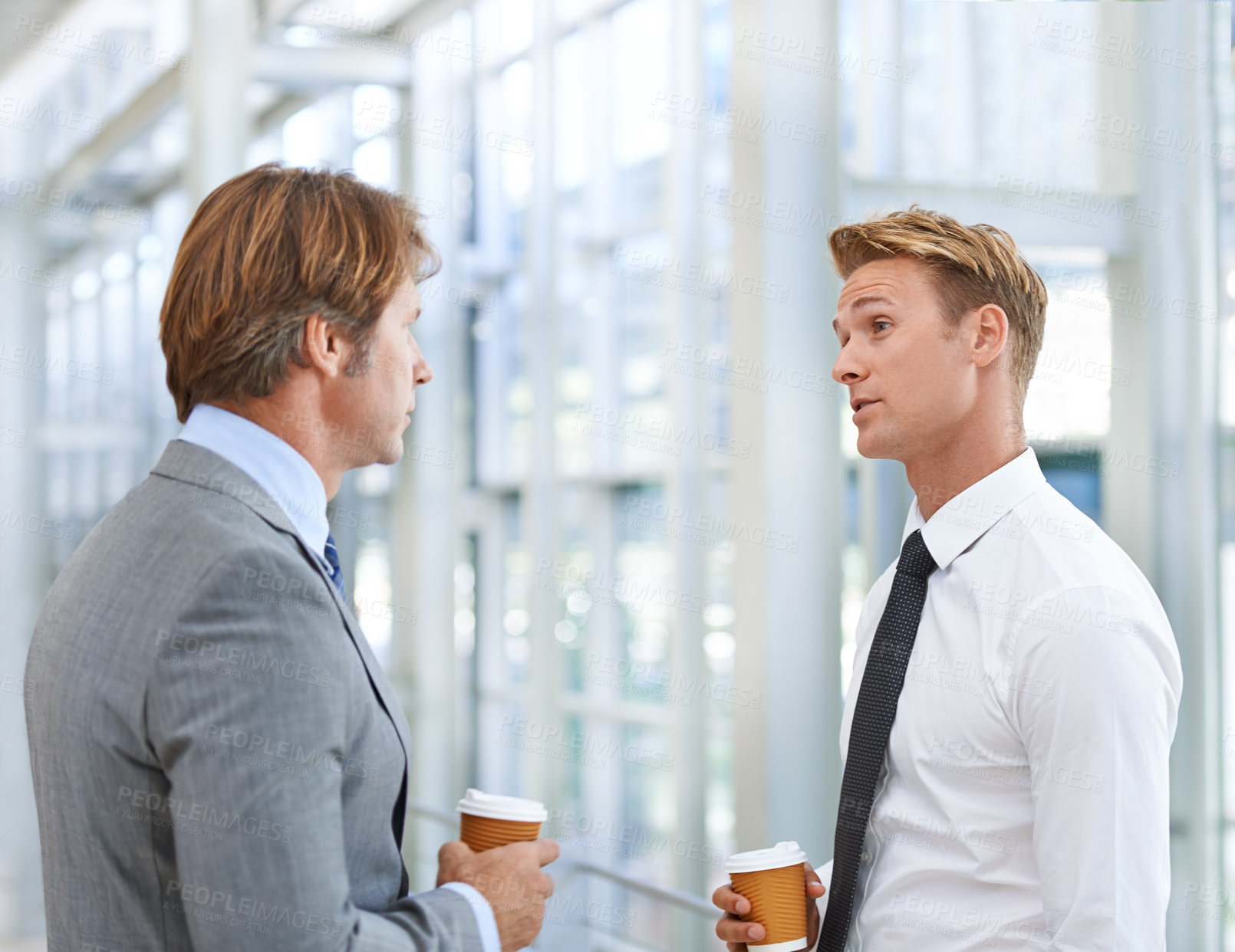 Buy stock photo Men, colleagues and business discussion or coffee in office as law attorneys for collaboration, teamwork or professional. Male people, caffeine and talk for corporate planning, project or networking