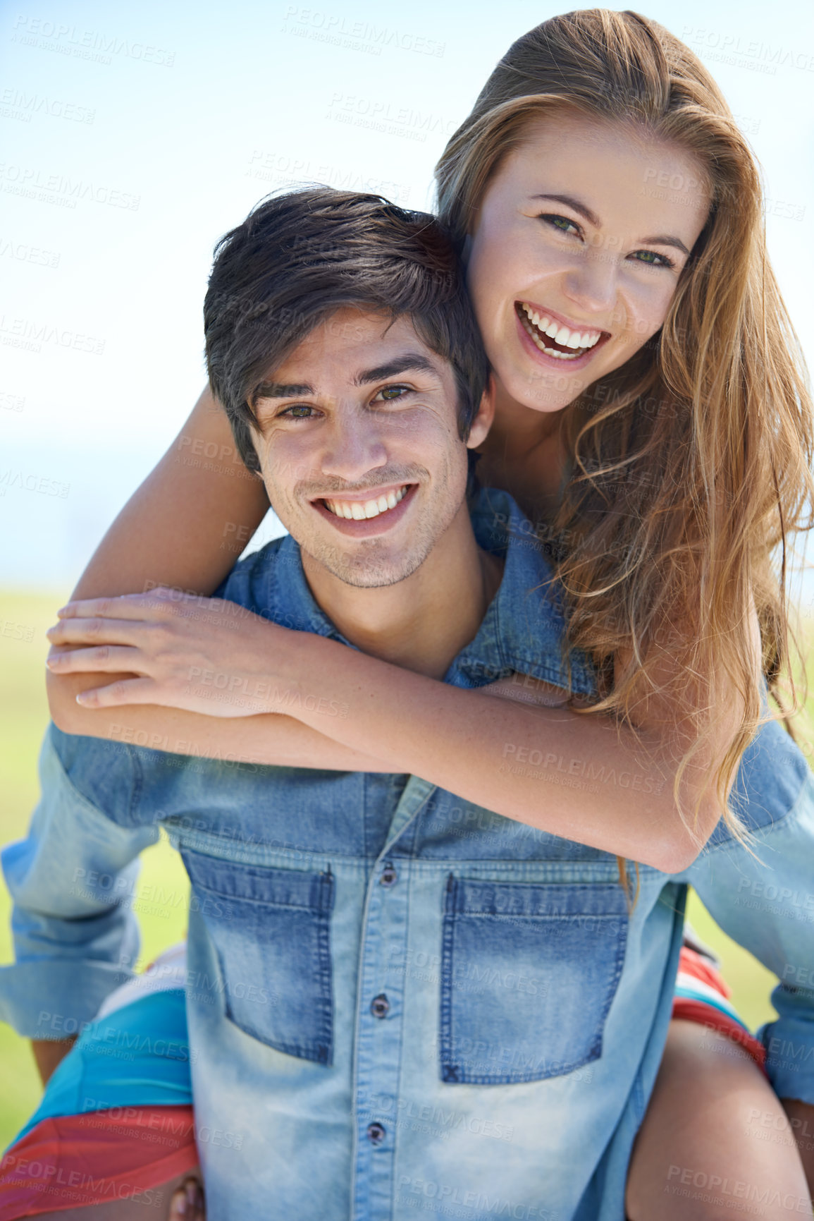 Buy stock photo Couple, portrait and piggyback for fun in nature, love and care in relationship on outdoor date. Happy people, embrace and carrying on holiday or vacation, bonding and laughing on adventure at park