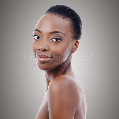 Buy stock photo Skincare, dermatology and portrait of black woman in studio with smile, natural makeup or facial glow. Cosmetics, beauty and face of happy girl on grey background for healthy skin, shine or wellness