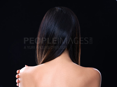 Buy stock photo Rearview studio shot of a model with beautiful brunette hair isolated on black