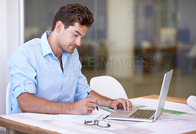 Buy stock photo Architect, laptop and man in office with blueprint, thinking and reading paper for renovation. Designer, engineer or creative developer at desk with building plan, computer and property upgrade.