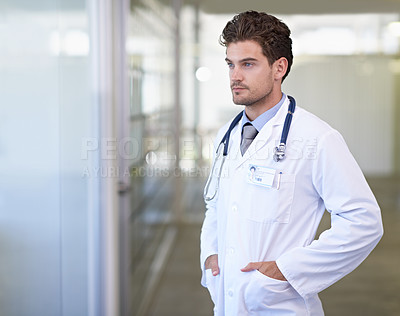 Buy stock photo Doctor, man and thinking in hospital with healthcare for wellness, medicine and surgery with stethoscope by window. Medical, professional and expert with ideas for diagnosis, health and decision