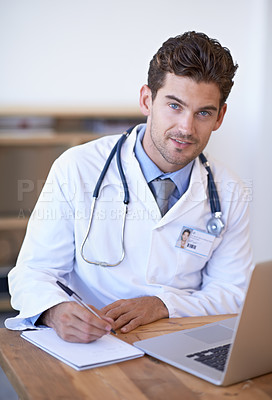 Buy stock photo Doctor, laptop and notebook with pen at desk for telehealth, appointment or patient report in office. Man, technology and writing on paper for planning, communication or health insurance in hospital