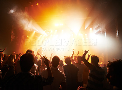 Buy stock photo Music concert, band or silhouette audience with music, rock and live performance, energy and festival with men or women. People, dance or lights at musical event, crowd or dancing to audio with stage