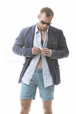 Buy stock photo Fashion, button and man in studio with clothes, trendy blazer, stylish outfit for a col aesthetic. Wearing, confidence or male model with a fancy style or edgy sunglasses isolated on white background