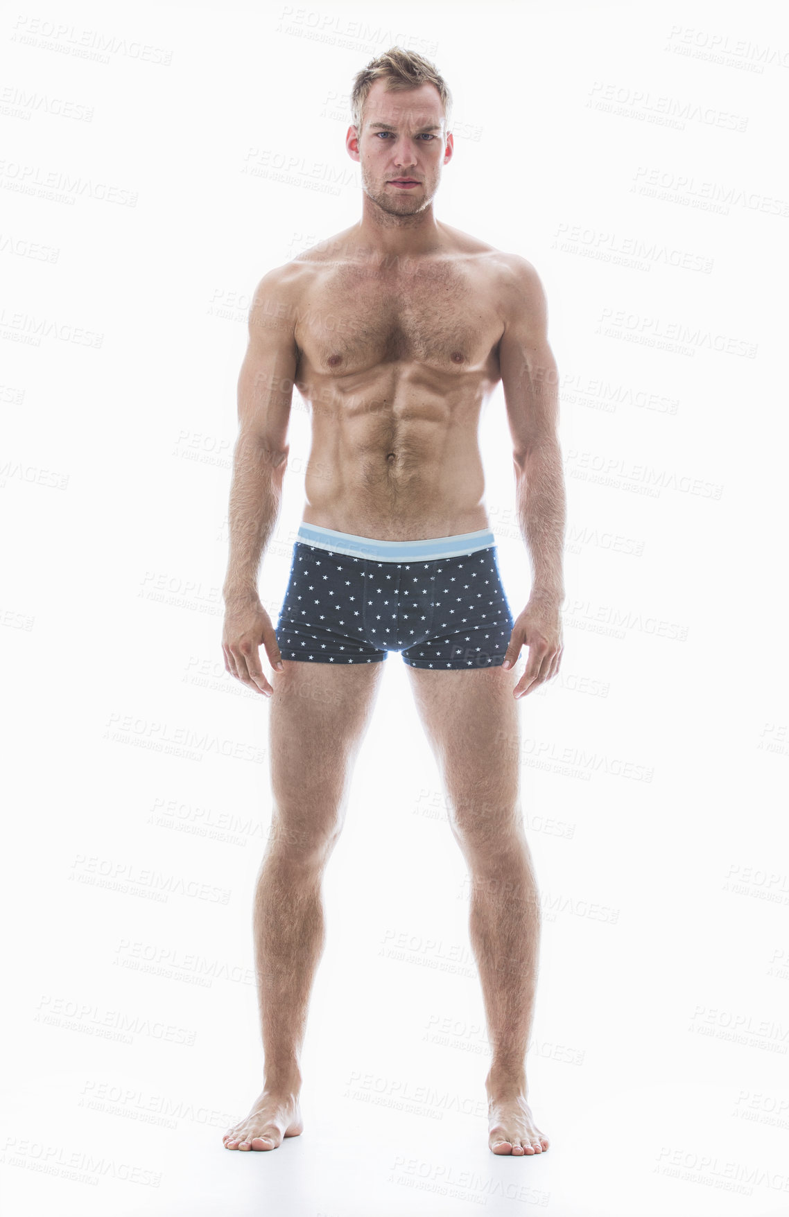 Buy stock photo Portrait, fitness and body of a man in studio isolated on a white background for health or wellness. Exercise, muscle and full length with a young male athlete or model posing in his underwear