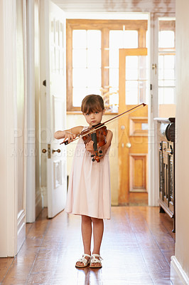 Buy stock photo Shot of a young girl playing violin