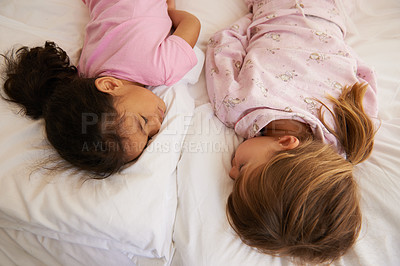 Buy stock photo Shot of cute little girls having a sleepover 