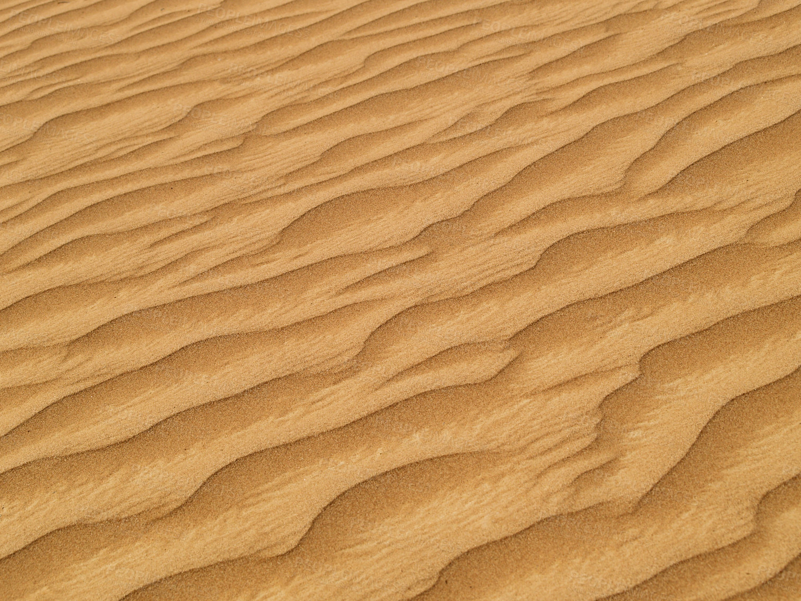 Buy stock photo Cropped image of wave-textured desert sand