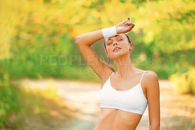 Buy stock photo Fitness, sweat and tired woman in a park with running break from intense morning cardio outdoor. Sports fatigue, burnout and female runner in a forest with low energy after marathon, training or run