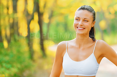 Buy stock photo Thinking, fitness and woman outdoor with happiness in woods or forest and idea for exercise. Planning, workout and runner smile in summer, nature or girl in park with pride and healthy mindset