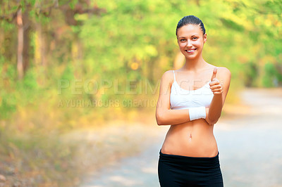 Buy stock photo Thumbs up, fitness and portrait of woman outdoor in woods or forest for exercise. Workout, achievement and girl smile in summer, nature or park with happiness, pride and confident runner sign for yes