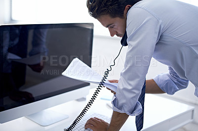 Buy stock photo Businessman, phone call and paperwork at computer for conversation with client for financial advice, loan or investment. Male person, telephone and documents in New York office, network or research