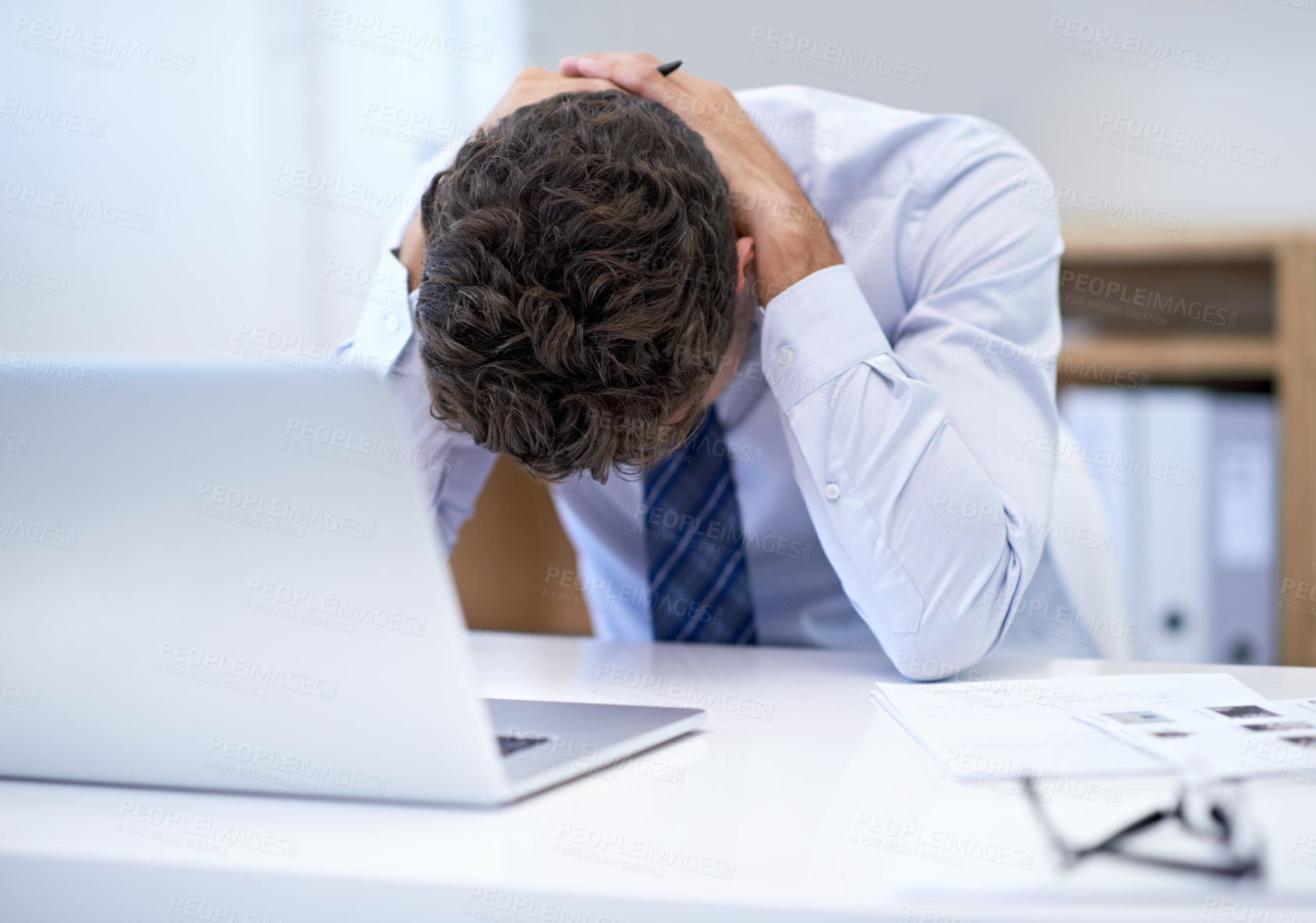 Buy stock photo Businessman, office and laptop with desk, stressed and frustrated with mistake or failure. Person, technology and headache with debt, report or burnout for corporate mental health or depression