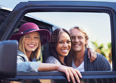 Buy stock photo Portrait of a group of friends leaning against their van at the side of the road