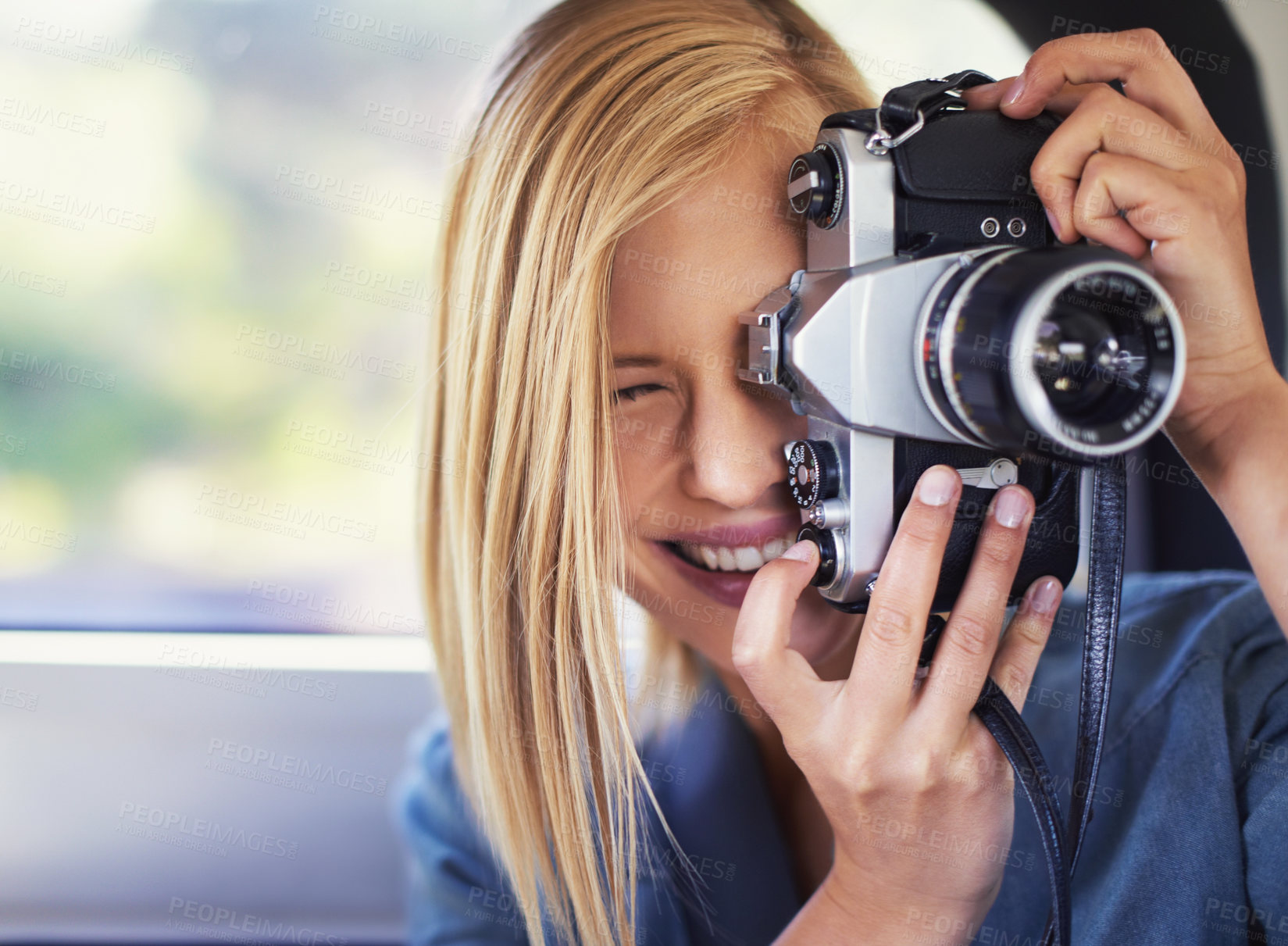 Buy stock photo Camera, photography and woman on road trip with journey, travel and creative hobby or photoshoot. Young freelancer, traveler or photographer shooting in car for digital memory, vacation and holiday