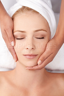 Buy stock photo A beautiful young woman enjoying a neck massage at the spa