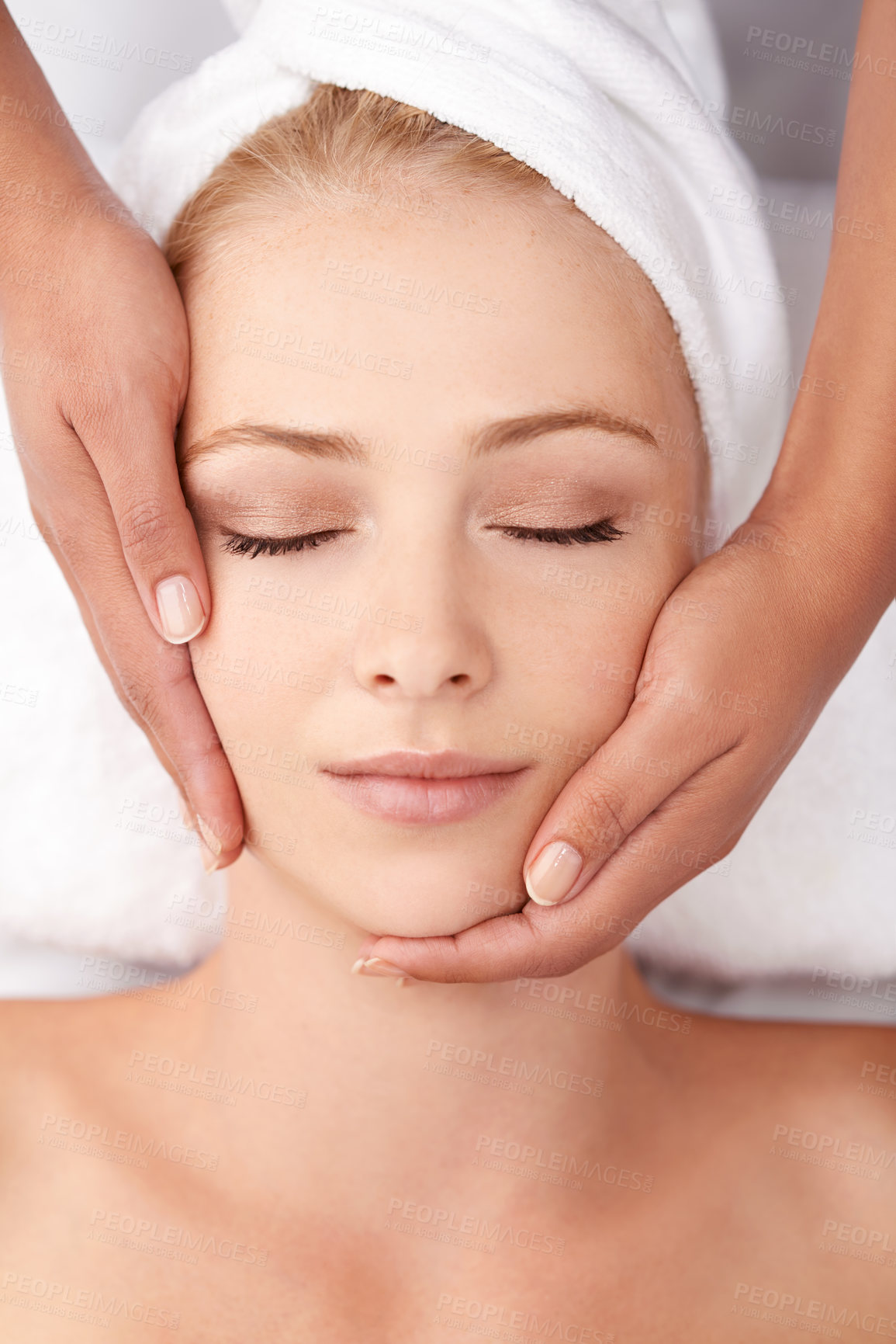 Buy stock photo A beautiful young woman enjoying a neck massage at the spa