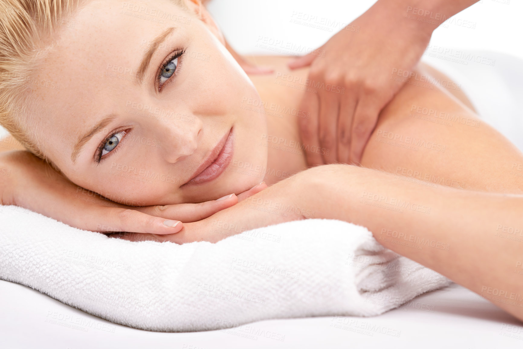 Buy stock photo Woman, portrait and body massage at spa with hands for treatment, skincare and wellness in studio. Face of a happy client or model relax on table with therapist for shoulder, muscle or stress relief