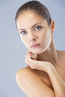 Buy stock photo Skincare, portrait and calm woman in studio for wellness, treatment or cosmetics on blue background. Natural beauty, face and model with glowing skin confidence, results or dermatology satisfaction