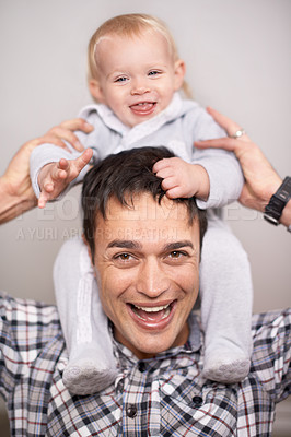 Buy stock photo Love, portrait or father and baby with piggyback, playing or bonding at home with shoulder games. Child development, learning and face of dad with girl having fun, support and laughing in family time
