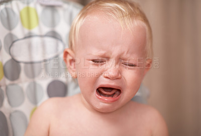 Buy stock photo Baby, sad child and crying in home alone in nursery with colic, frustrated and unhappy. Young kid, toddler and tears of infant screaming for stress, depression and upset with face expression of pain