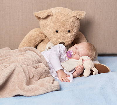 Buy stock photo Shot of an adorable baby girl sleeping with her toys