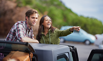 Buy stock photo Couple, pointing at view and road trip for travel, happy with love and adventure in Australia. Direction, vacation and people in car outdoor, trust and commitment with journey and smile for tourism